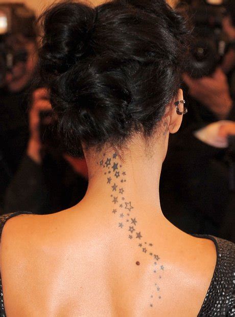 The Stars Down The Back Of Her Neck A Guide To Rihannas Tattoos