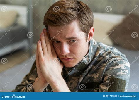 Stressed Veteran Soldier Engrossed In Depressive Thoughts And Memories