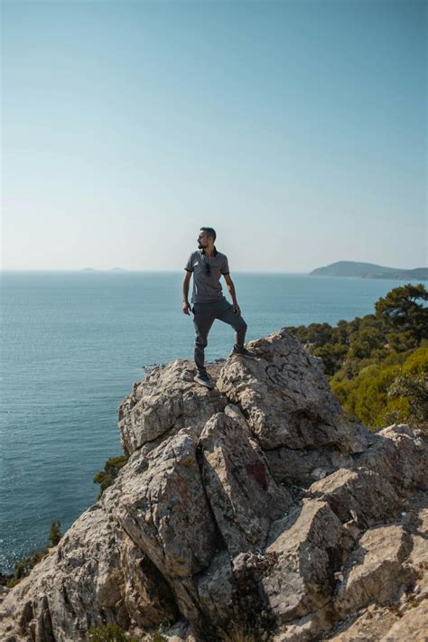 Man Standing On Rock · Free Stock Photo