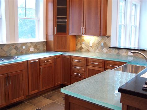 Palm springs kitchen cabinets homeowners tasked with remodeling their palm springs kitchen cabinets tend to have one thing in common: glass countertops | Glass countertops, Countertops, Glass kitchen countertops