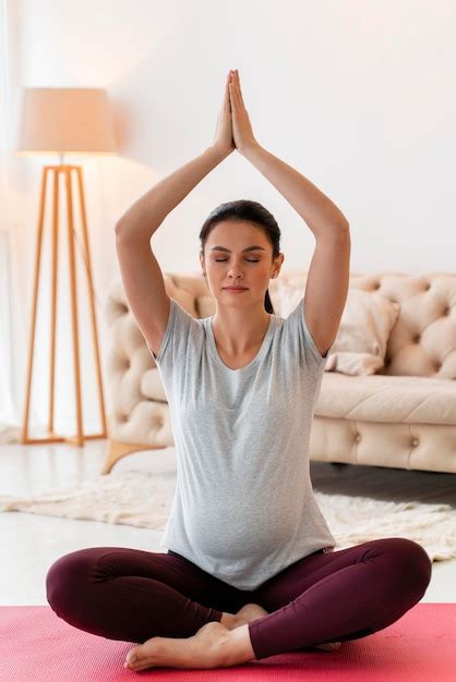 Premium Photo Pregnant Woman Meditating Indoors