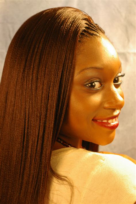 The main braids are separated by two thin parting braids. SG1S0958 | Worldofbraiding Blog