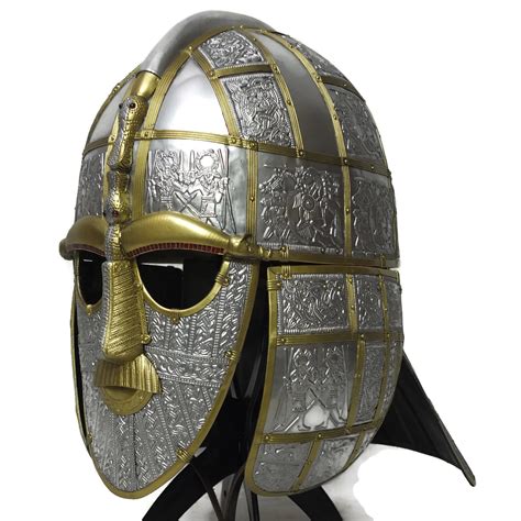 In the sutton hoo ship burial the cap of the helmet was formed from a size piece of iron and it is divided into ornamental zones. Larp Armour Sutton Hoo helmet