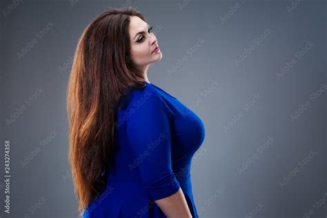 Brunette Plus Size Fashion Model In Blue Dress Fat Woman With Long