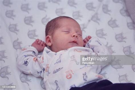 Hispanic Baby Sleeping In Crib Photos And Premium High Res Pictures