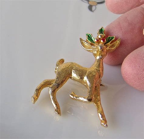 vintage reindeer brooch gold tone green holly christmas pin holly christmas christmas pins