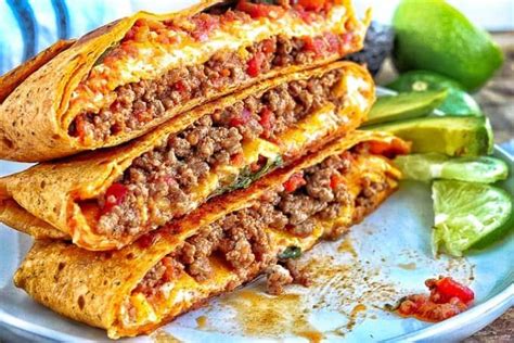 Taco bell's crunchwrap supreme is a clever marriage between a cheesy quesadilla and crunchy beef tostada. Homemade Crunchwrap Supreme recipe includes a video and is ...