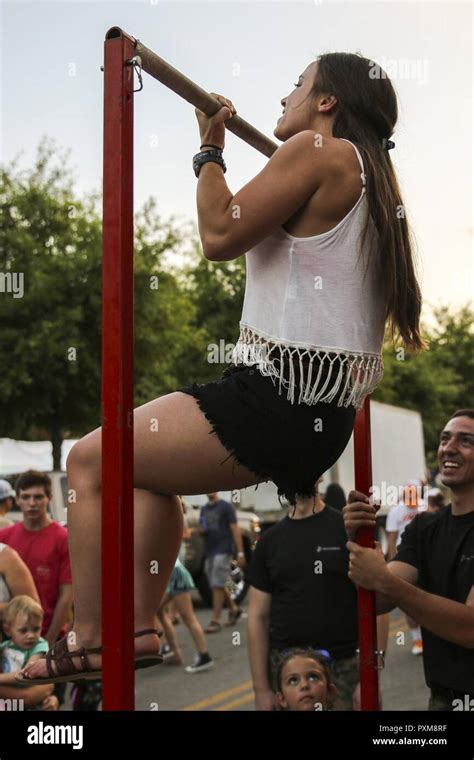 A Riverbend Festival Attendee Attempts Pull Ups In Chattanooga