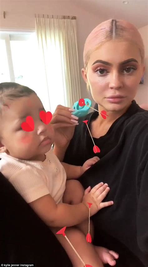 Kylie Jenner Places Red Hearts Over Stormis Eyes For Latest Video
