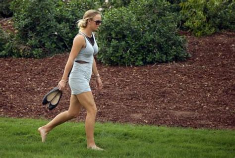 She is the first danish tennis player to. Retro Bikini: Caroline Wozniacki Wears Grey Mini Dress At ...