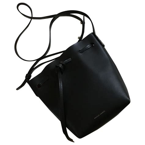 Iconic Mansur Gavriel Mini bucket bag in black Italian tanned leather. Never used, mint ...