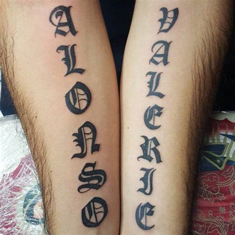 Two People With Matching Tattoos On Their Legs