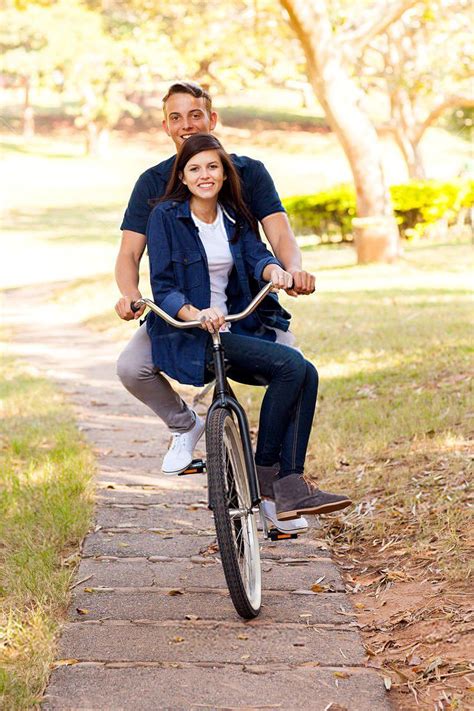 Teenage Couple Riding Bicycle Teenage Couples Riding Bicycle Couple Ride
