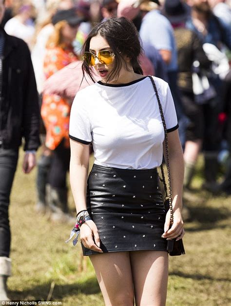 Charli Xcx Shows Off Shapely Legs In Short Leather Skirt At Glastonbury