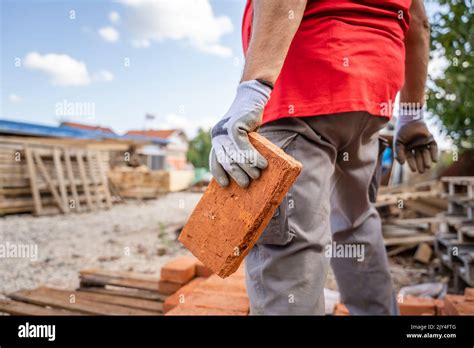 Construction Worker Carrying Bricks Hi Res Stock Photography And Images