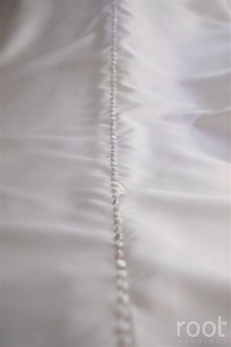 Suits is one of those shows where once you start watching it you can't stop. Buttons down the back of Rachel's wedding gown. #root ...