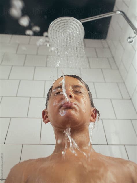 Boy Taking A Shower By Dejan Ristovski