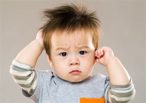 Baby Boy Feeling Confused Stock Photo Image Of Itch 40943064