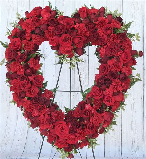 All Rose Heart Shaped Funeral Standing Spray By Paula Funeral