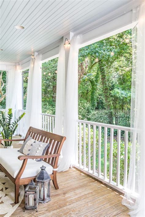 This diy project added patio lighting and curtains to our outdoor sitting areas without using any electricity. DIY Outdoor Curtains and Screened Porch for Under $100 ...