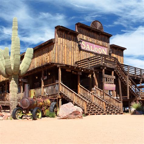 Old Wild West Desert Cowboy Town With Cactus And Saloon Switch Media
