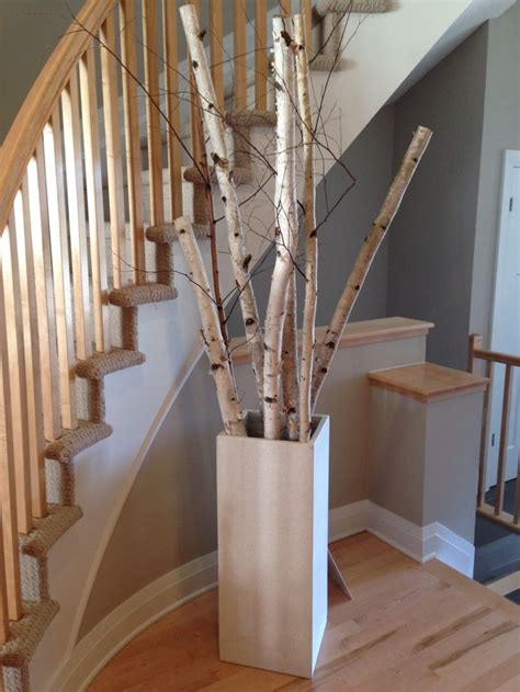 Desks and tabletops can be decorated with indoor metal lanterns, gingerbread houses and. Interesting grouping of birch tree branches. | Birch tree ...