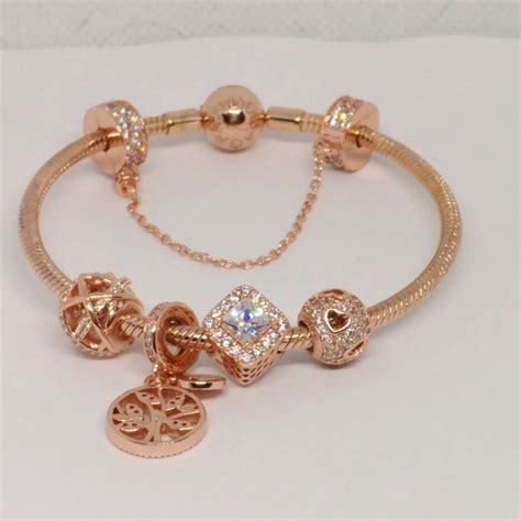 Pandora Rose Gold Bracelet With 5 Pandora Rose Gold Charms Set Size 71