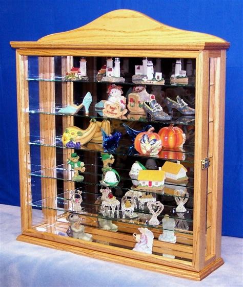 Use this 15.75 wide hornbeam wood curio cabinet to display all your collectibles in your home or business. Wall Hanging Curio Cabinet Display - Cabinets & Cupboards