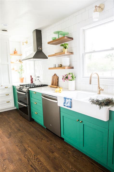 Wall mounted and floating shelves(24). Bold, Small Kitchen with Green Cabinets and Slate Appliances