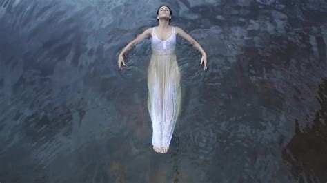 Woman Floating In Lake Stock Video Motion Array