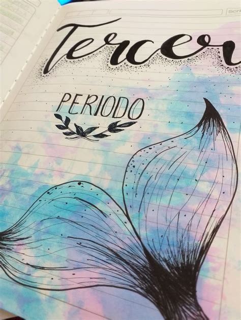 An Open Notebook With The Words Perigoo On It And A Drawing Of A Flower