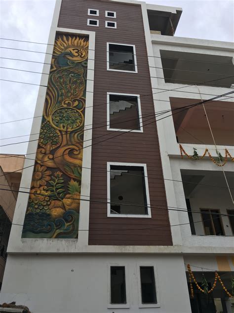 Traditional Exterior House Front Wall Plaster Design