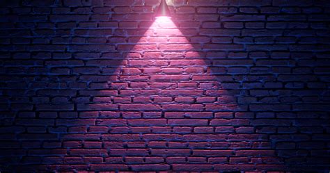 3d Rendering Brick Wall Illuminated By Neon Pink Light From Spotlights