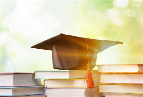 Graduation Cap On Books Arizona Friends Of Foster Children Foundation