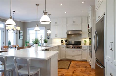 Simply white has a light reflecting value of almost 92% (very high, even higher than super white, which has virtually no undertones), compared to white dove's lrv of about 85%. Benjamin Moore White Dove Cabinets in Traditional Kitchen