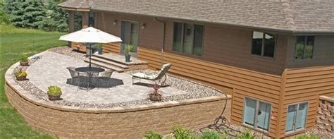 A retaining wall will normally have a high newton block/reinforced concrete wall, often with piers, sitting on a reinforced foundation, even. 5 ways to improve your outdoor space with retaining walls