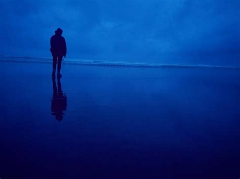 Premium Photo Rear View Of Silhouette Man Standing In Sea Against Sky