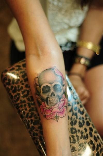 I work the day after i get my tattoo. Skull with rose forearm tattoo design for women ...