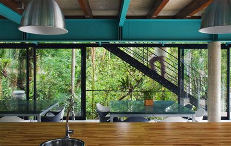 Exotic Jungle House Offers Multi Level Living Behind Glass