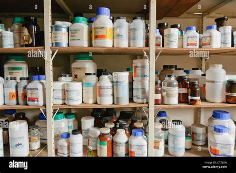 Chemicals On The Shelves Of A School Chemistry Laboratory Stock Photo