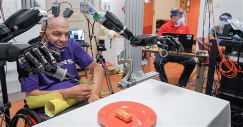 Quadriplegic Man Using Two Robot Arms Can Feed Himself Again