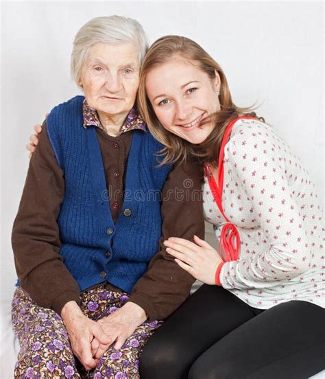 The Sweet Girl And The Old Woman Staying Together Stock Image Image