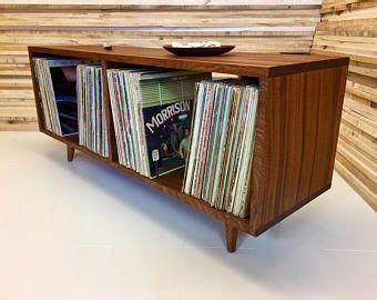 The player also has record storage inside. Solid mahogany turntable cabinet with album storage. Mid ...