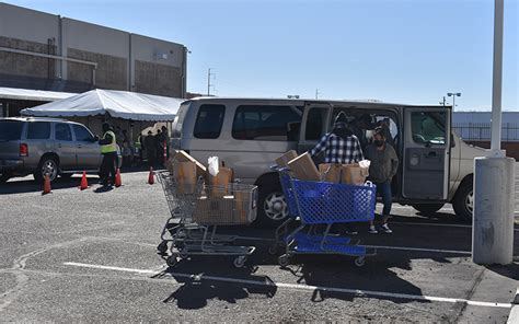 We filled boxes that get passed out to families in need. St. Mary's Food Bank shifts gears during COVID-19 pandemic