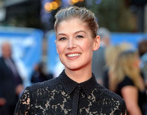 rosamund pike says people have ridiculously high expectations of marriage nowadays