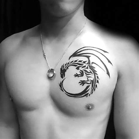 32 Awesome Chest Tattoos For Men In 2020 The Trend Spotter Tribal Chest Tattoos Small Chest