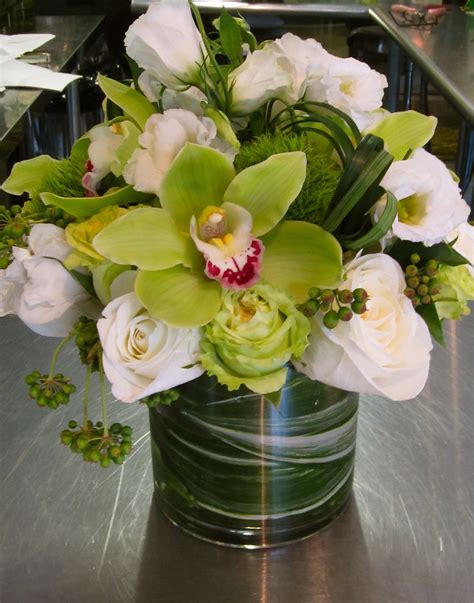 White And Green Roses Green Cymbidium Orchids Bear Grass Lisianthus Dianthus Berries