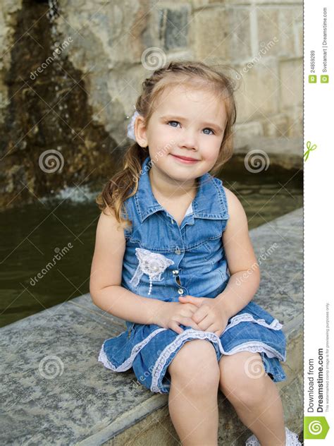 Portrait Of Cute Little Girl In Dress Outdoor Royalty Free