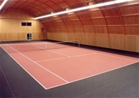 Ridding up in any region! Indoor shot of Tennis court - Private Tennis Facility in ...