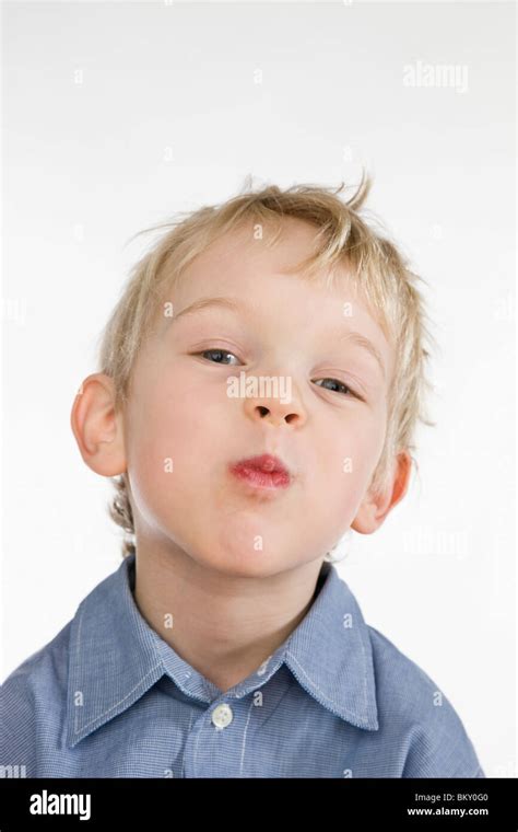 Small Boy Making Faces Stock Photo Alamy